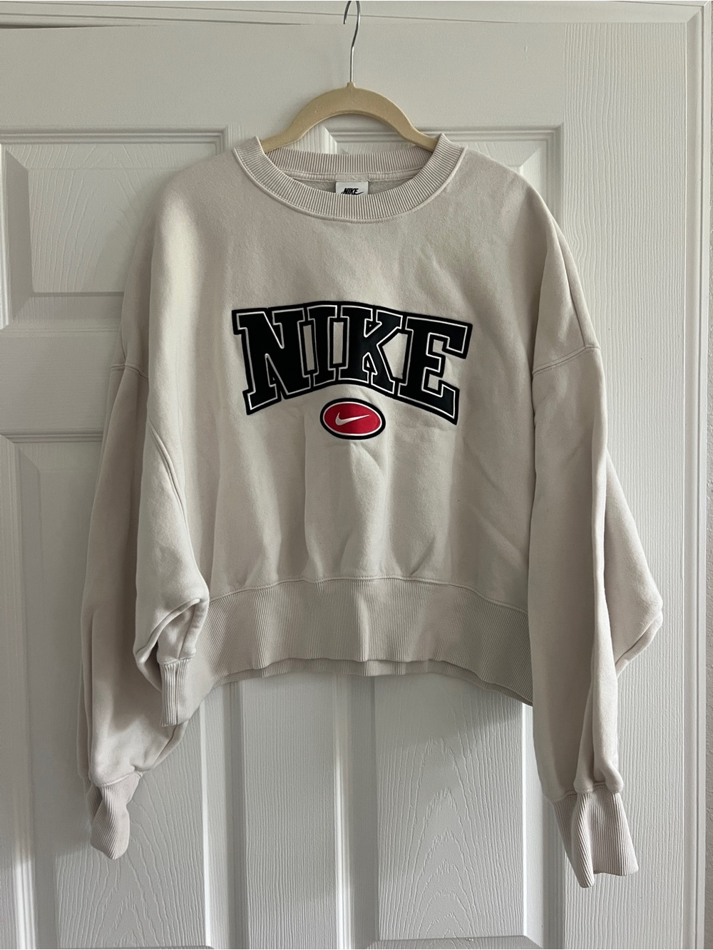 Nike Cream Crewneck Sweatshirt with Black Logo and Red Accent